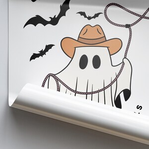 May include: A white ghost wearing a brown cowboy hat and holding a lasso. The ghost has two black eyes and is surrounded by bats.