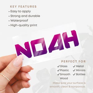 May include: A white sticker featuring the name "NOAH" in bold, purple gradient lettering. Suitable for glass, metal, plastic, mirrors, bottles, and wood. The sticker is easy to apply, strong, waterproof, and has a high-quality print.