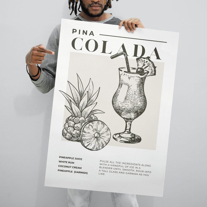 May include: A black and white illustration of a Pina Colada cocktail recipe. The recipe includes pineapple juice, white rum, coconut cream, and a pineapple garnish. The text reads "Pina Colada" in large letters at the top of the image.
