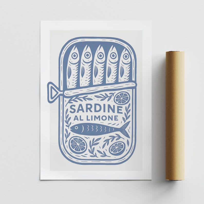May include: A blue and white print featuring a sardine can with the text "SARDINE AL LIMONE". The can contains five fish and is decorated with lemons and leaves. The print is on a white background.