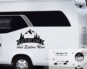 May include: Black and white decal sticker with a mountain range, trees, and the text "Let's Get Lost And Explore More".