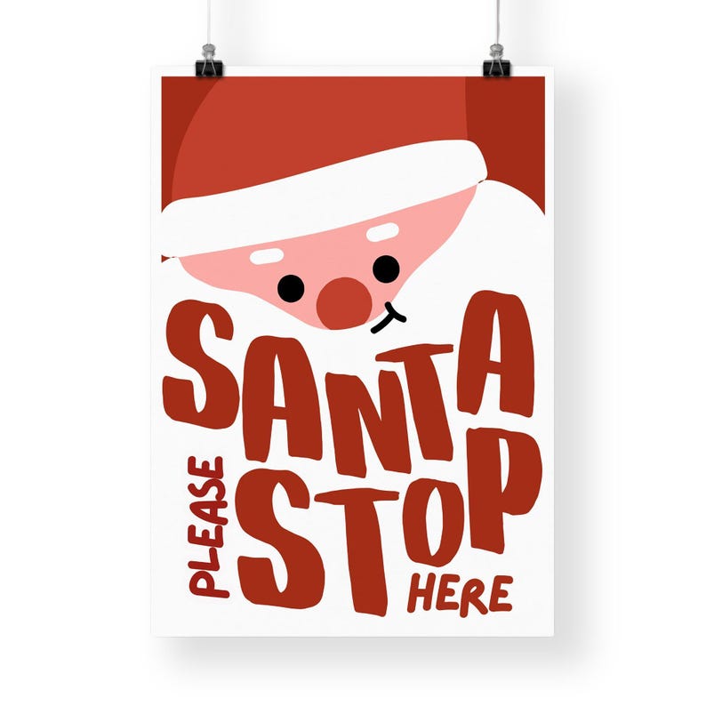 May include: A white sign with red text that says "PLEASE SANTA STOP HERE". A cartoon Santa Claus face is peeking out from the top of the sign.