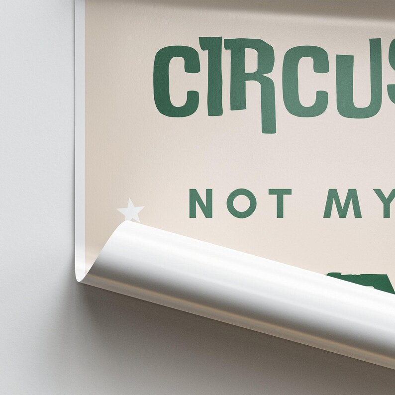May include: A beige poster with green text that reads "CIRCUS NOT MY...