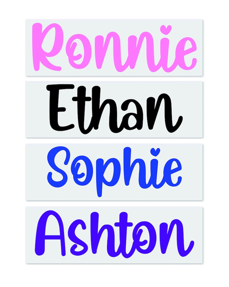 May include: Four rectangular name labels with names: Ronnie in pink, Ethan in black, Sophie in blue, and Ashton in blue. Each name is written in a cursive font on a white background. A small pink heart appears above the "i" in Ronnie and Sophie.