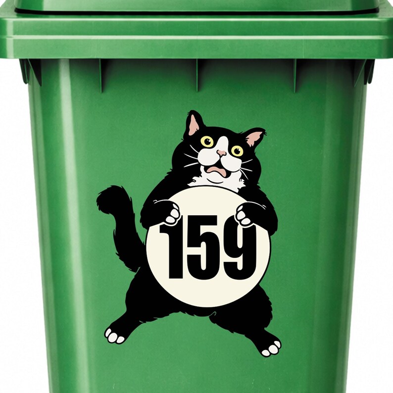 May include: A green trash bin with a black and white cat sticker. The cat is holding a white circle with the number 159 in black. The cat has yellow eyes and a surprised expression.