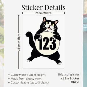 May include: A black cat sticker with the numbers "123" on a cream-colored circle. The sticker is 21cm wide and 28cm high. The text "Sticker Details" is at the top. The sticker is made of glossy vinyl and is customizable.