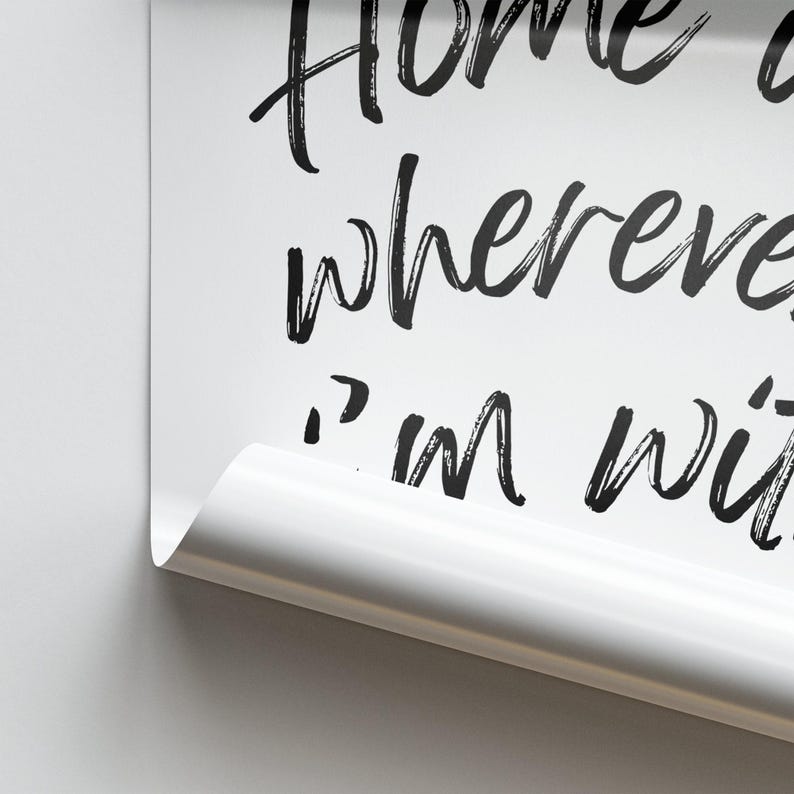 May include: White background with black text that reads "Home is wherever I'm with you".