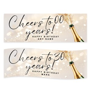 以下が含まれることがあります： シャンパンをテーマにした2つのバナー。上部のバナーには「Cheers to 00 years!」と書かれており、その下に「Happy Birthday Any Name」と書かれています。下部のバナーには「Cheers to 30 years!」と書かれており、その下に「Happy Birthday Mark」と書かれています。どちらのバナーにもシャンパンボトルが描かれています。