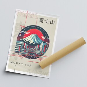 May include: A retro-style poster with a graphic illustration of Mount Fuji and a cityscape in front of it. The poster has a red, white, and blue color scheme and the text "TOKYO 富士 山 MOUNT FUJI TOKYO" in a stylized font.