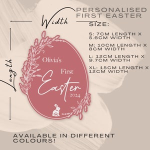 May include: Personalized First Easter sign with a pink background and white floral design. The sign says "Olivia's First Easter 2024" and includes a bunny rabbit. Available in different sizes: S: 7cm x 5.6cm, M: 10cm x 8cm, L: 12cm x 9.7cm, XL: 15cm x 12cm.