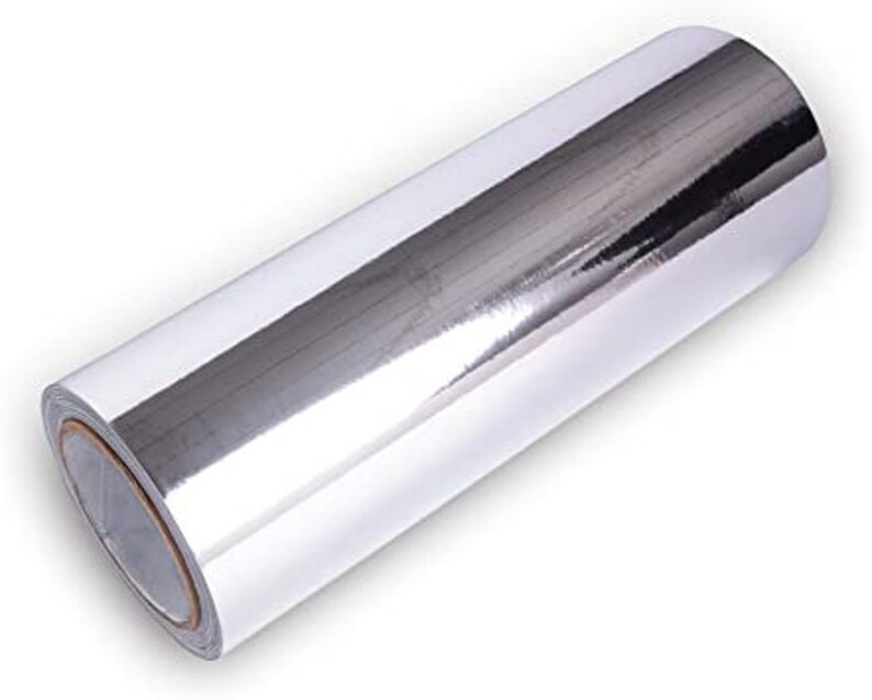 May include: A roll of silver chrome vinyl wrap. The vinyl is shiny and reflective.
