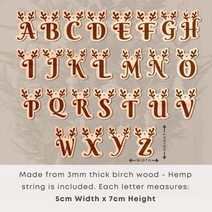 May include: Wooden alphabet letters, each adorned with reindeer antlers, are displayed. The letters are made of light brown wood and measure 5cm wide and 7cm high. Hemp string is included. The letters are perfect for holiday decorations.