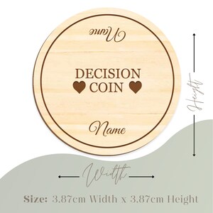 May include: A round wooden decision coin with the words "DECISION COIN" and two heart symbols. The word "Name" is written in a script font at the top and bottom of the coin. The coin measures 3.87cm in width and 3.87cm in height.