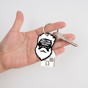 May include: Black and white keychain with a beard and the text "Only the best dads have a great beard".