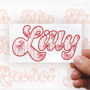 personalised sticker custom name label vinyl decal kids bottle sticker school name tag preppy aesthetic bow sticker pink striped decal laptop name sticker water bottle label glossy waterproof name vinyl cute custom lettering gift for girls customised name tag bottle decal