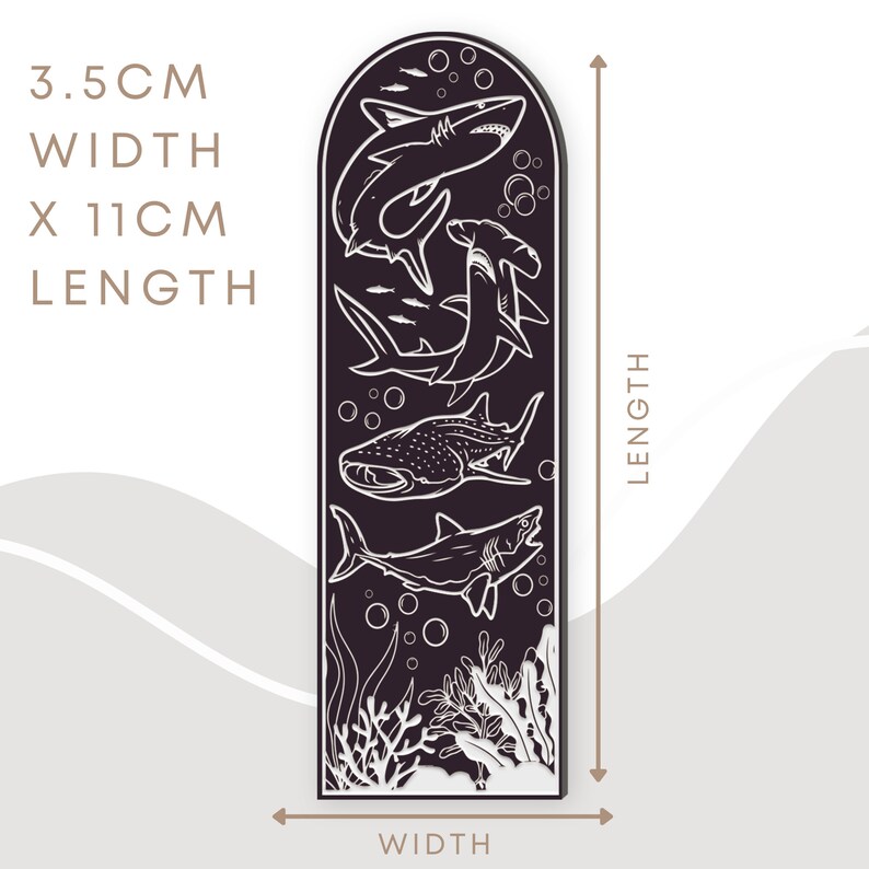May include: A black and white illustration of four different sharks and a coral reef on a dark purple background. The image measures 3.5 inches wide by 11 inches long.