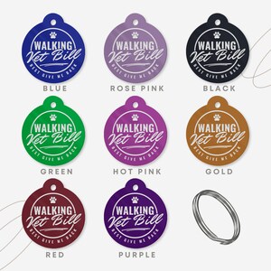 May include: Nine round dog tags with the text "Walking Vet Bill" in white lettering on a variety of coloured backgrounds. The colours include blue, rose pink, black, green, hot pink, gold, red, and purple.