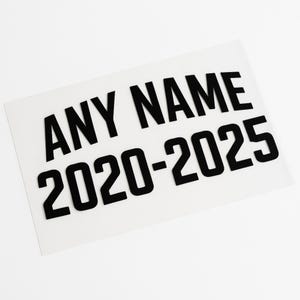 May include: Black and white vinyl sticker with the text "ANY NAME 2020-2025".