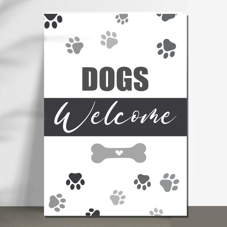 May include: A white sign with the words "DOGS Welcome" in black and white. The sign features paw prints and a bone graphic. The design is simple and suitable for a pet-friendly environment.
