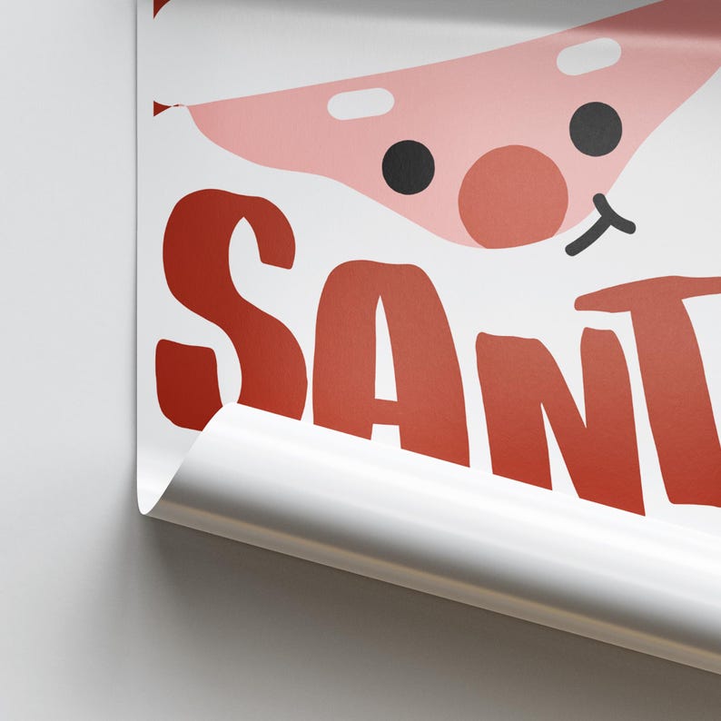 May include: A white poster with the word "SANTA" in red lettering. A cartoon Santa face is partially visible in the top right corner of the poster.