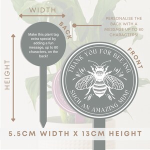 May include: A gray plant tag with a bee illustration and the text "Thank you for bee-ing such an amazing mum!" The tag is 5.5 inches wide and 13 inches tall.