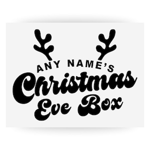 May include: A white background with black text that reads "ANY NAME'S Christmas Eve Box." Above the text are two black reindeer antlers. The text is in a bold, retro font.