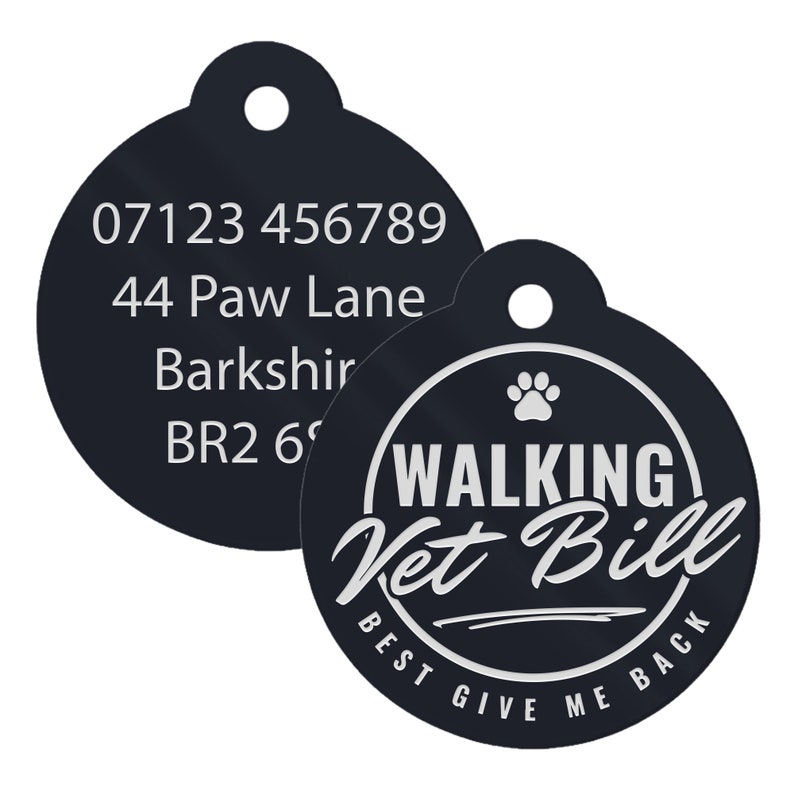 May include: Two black round dog tags. The first tag has a phone number, address, and city. The second tag has a paw print and the text "WALKING Vet Bill BEST GIVE ME BACK".