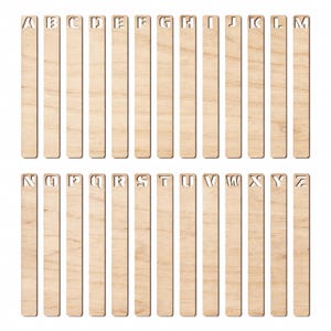 May include: A collection of twenty-six wooden bookmarks, each featuring a different letter of the alphabet. The letters are cut out of the wood, and the bookmarks are arranged in rows. The wood has a light, natural color.