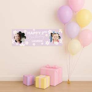 May include: A lavender banner with the text "HAPPY 2ND Birthday Lauren" and daisy accents. Two photos of a young child are featured in flower-shaped cutouts. Pastel balloons and wrapped gifts are also visible.