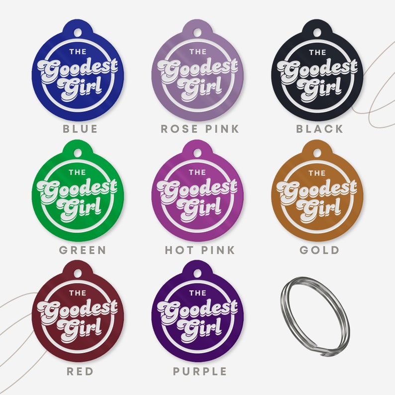 May include: Nine round stickers with the text "The Goodest Girl" in a retro font. The stickers are in various colors including blue, rose pink, black, green, hot pink, gold, red, and purple.