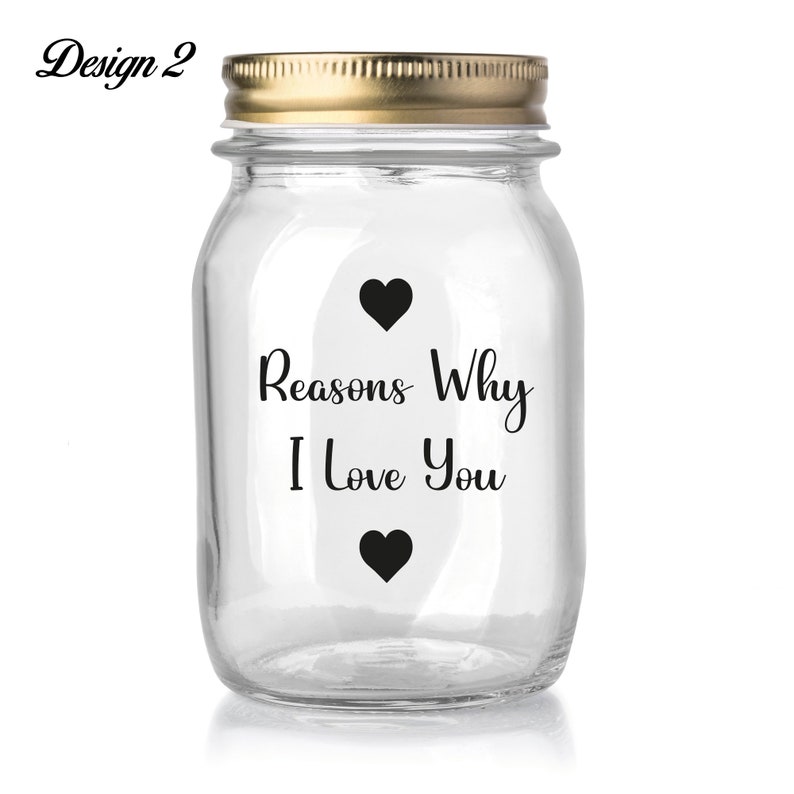 May include: A clear glass jar with a gold lid. The jar has a black vinyl sticker with the text "Reasons Why I Love You" and two black hearts.