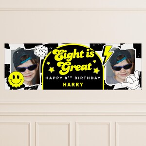 May include: A personalized birthday banner with a black and white checkered background. The banner features a photo of a child wearing sunglasses and a baseball cap. Text reads "Eight is Great" and "Happy 8th Birthday Harry."