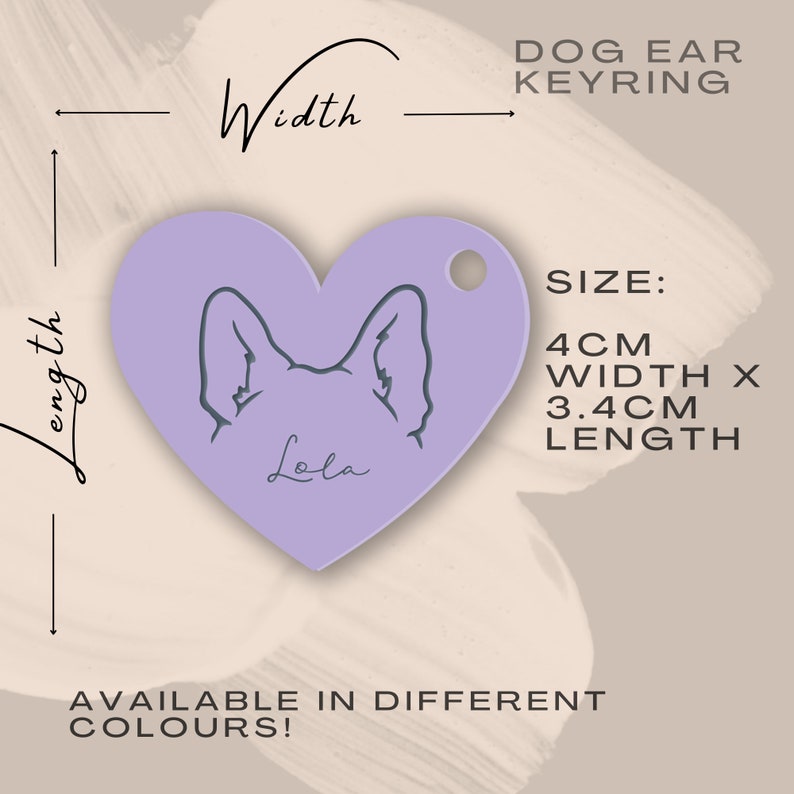 Op de afbeelding: Paarse hartvormige sleutelhanger met een hondenpoot en de naam "Lola" erop gegraveerd. De sleutelhanger is 4 cm breed en 3,4 cm lang.