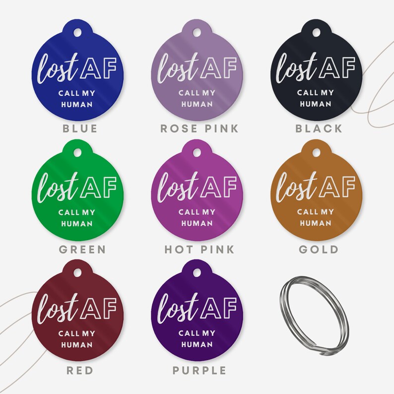 May include: Nine round pet ID tags in various colors, including blue, rose pink, black, green, hot pink, gold, red, and purple. Each tag features the text "lost AF" with the words "CALL MY HUMAN" underneath.