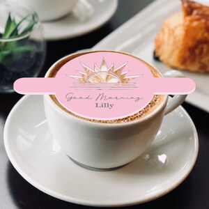May include: A pink coffee stencil with a sunrise design and the text "Good Morning Lilly".