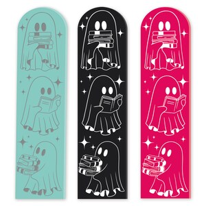 May include: Three ghost bookmarks with different coloured backgrounds. The ghosts are white and are holding books or stacks of books. The backgrounds are teal, black, and pink.