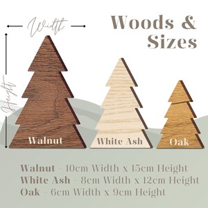 May include: Three wooden Christmas tree ornaments in different sizes and wood types: walnut, white ash, and oak. The walnut tree is the largest, measuring 10 inches wide and 15 inches tall. The white ash tree is 8 inches wide and 12 inches tall. The oak tree is the smallest, measuring 6 inches wide and 9 inches tall.