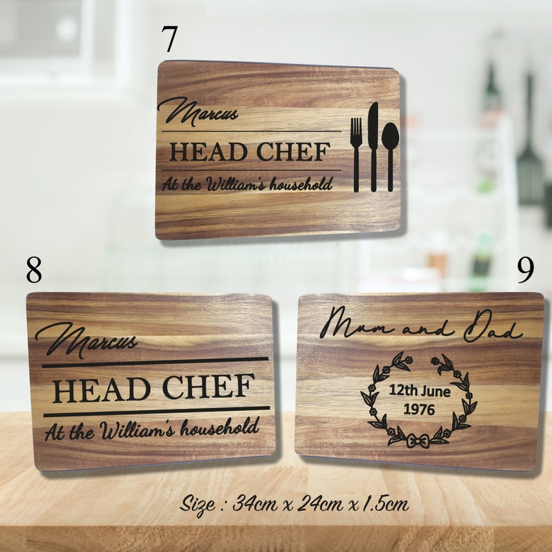 May include: Two wooden cutting boards with engraved text. The first board says "Marcus HEAD CHEF At the William's household" with a fork, knife, and spoon graphic. The second board says "Marcus HEAD CHEF At the William's household". The third board says "Mom and Dad 12th June 1976" with a wreath and bow graphic. The boards are 34 cm x 24 cm x 1.5 cm.