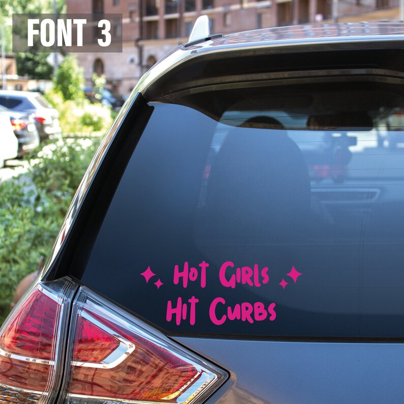 May include: A pink car sticker with the text "Hot Girls Hit Curbs" and two small diamond shapes.