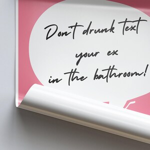 May include: Pink and white speech bubble with the text "Don't drunk text your ex in the bathroom!"