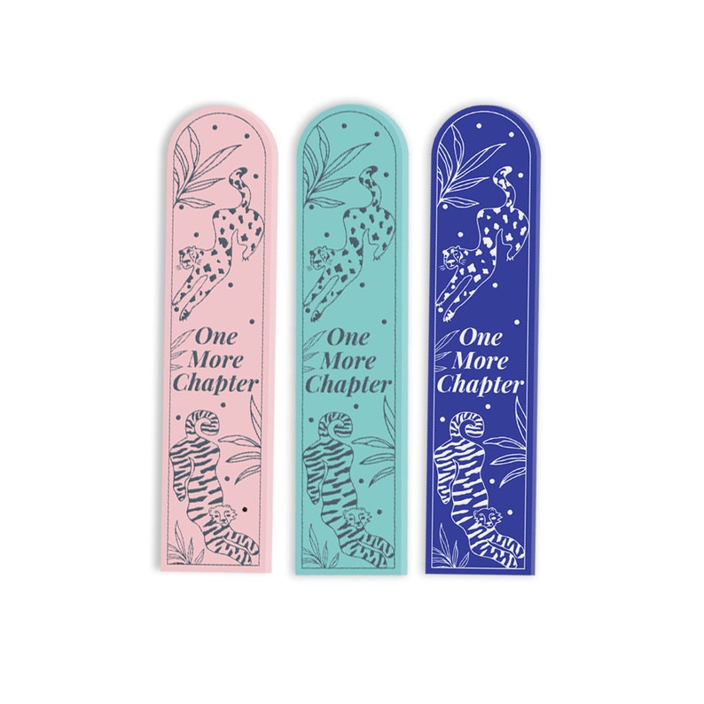 May include: Three bookmarks with a cheetah design and the text "One More Chapter". The bookmarks are pink, blue, and green.