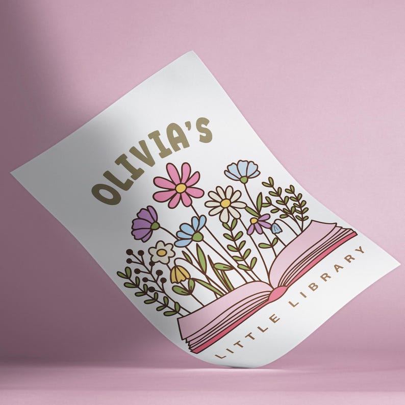 May include: A white print featuring the text "OLIVIA'S LITTLE LIBRARY" in gold, with an open book design. The book is surrounded by colorful flowers in pink, purple, blue, and yellow, with green leaves.