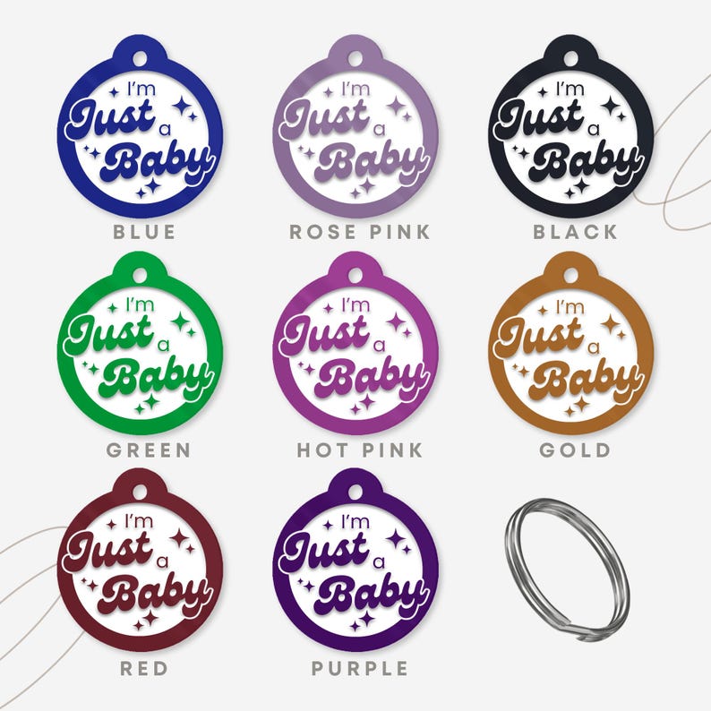 May include: Nine round, colorful, blank tags with the text "I'm Just a Baby" in a retro font. The tags are in blue, rose pink, black, green, hot pink, gold, red, purple, and white.