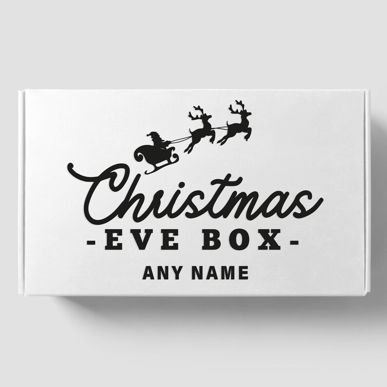 May include: White box with black text and a silhouette of Santa Claus in a sleigh pulled by reindeer. The text reads "Christmas - EVE BOX - ANY NAME".