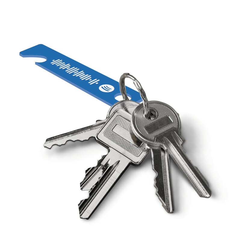 May include: A set of silver keys with a blue key chain featuring a Spotify logo and a barcode.