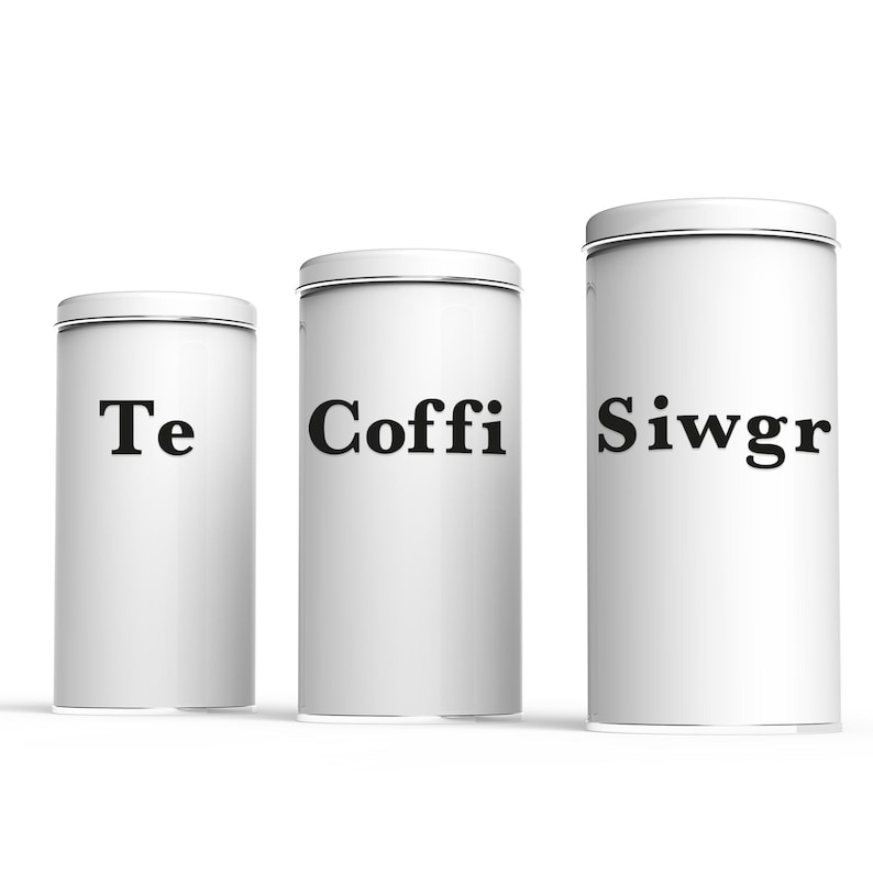 May include: Three white cylindrical canisters with silver rims. The canisters are labeled "Te", "Coffi", and "Siwgr" in black text. The canisters are arranged in a row against a white background.