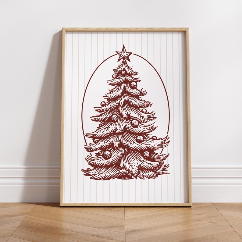 May include: A framed print featuring a detailed illustration of a Christmas tree. The tree is rendered in a deep red hue, adorned with ornaments and topped with a star. The background has vertical stripes.