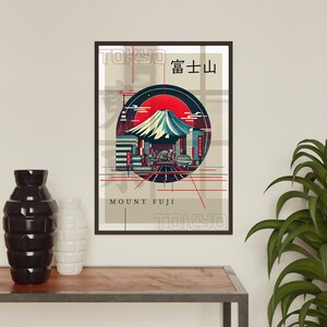 May include: A poster with a graphic design of Mount Fuji in Tokyo, Japan. The poster has a red circle with a stylized image of Mount Fuji and the city of Tokyo in the background. The text "Mount Fuji" and "Tokyo" are written in black at the bottom of the poster. The text "富士山" is written in Japanese at the top of the poster.