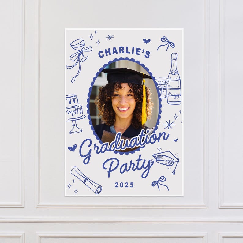 May include: A graduation party poster featuring a photograph of a person in a graduation cap. The poster includes blue illustrations of champagne, a cake, and a scroll. The text reads "Charlie's Graduation Party 2025."