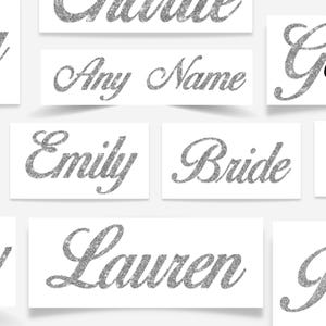 May include: A set of silver glitter name decals with the words "Bride", "Emily", "Lauren", and "Any Name".